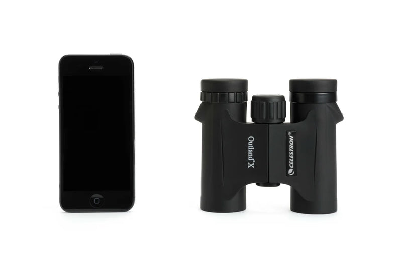 Celestron Outland X 8x25 roof binoculars with compact design, featuring black body and textured grips, ideal for outdoor viewing.