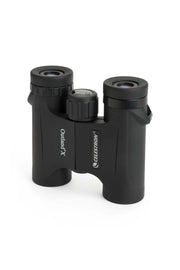 Celestron Outland X 8x25 roof binoculars with compact design and rubber armor for easy grip and outdoor viewing.