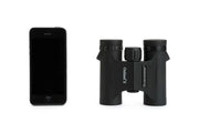 Celestron Outland X 10x25 roof binoculars showing compact design with black body and eyepieces, ideal for outdoor viewing.