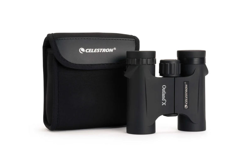 Celestron Outland X 10x25 roof binoculars showing compact black design with rubber armor for grip and durability.
