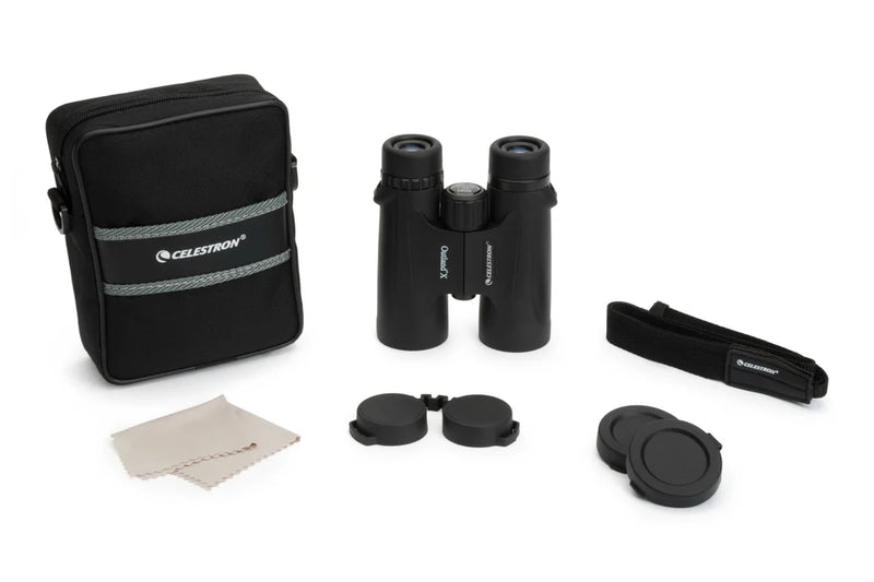 Celestron Outland X 8x42 roof binoculars with included accessories, showcasing the durable design and optical lenses.