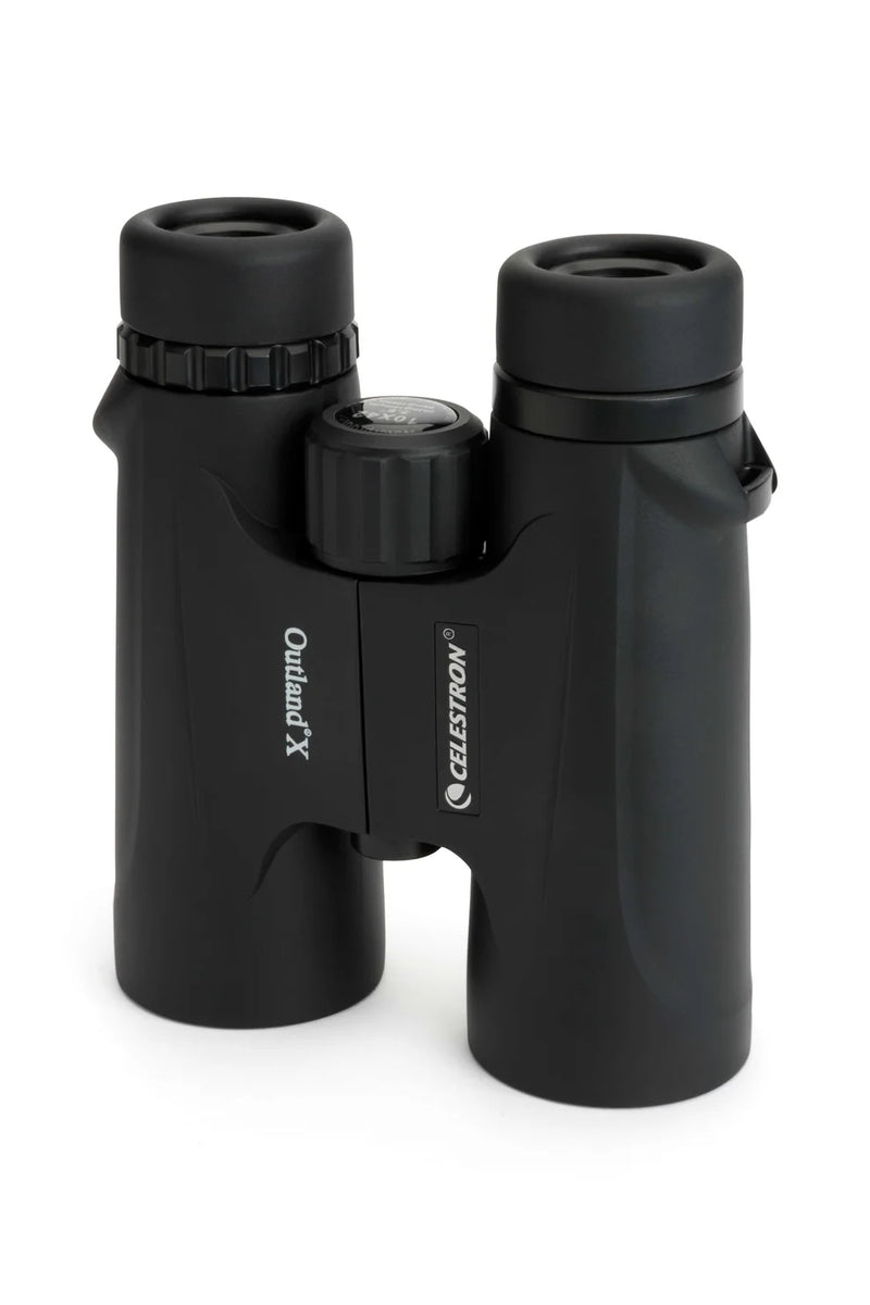 Celestron Outland X 10x42 roof binoculars with black body, standing upright, showing the eyepieces and central focusing wheel.