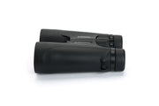 Celestron Outland X 10x50 roof binoculars showing large objective lenses and durable rubber armor for outdoor viewing.