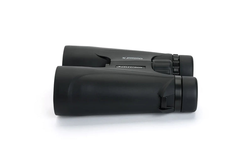 Celestron Outland X 10x50 roof binoculars showing large objective lenses and durable rubber armor for outdoor viewing.