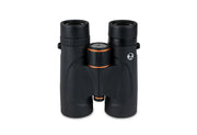 Celestron Regal ED 10x42 roof binoculars showing black body, large eyepieces, and textured grip for outdoor viewing.