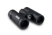 Celestron TrailSeeker ED 10x32 roof binoculars showing close-up of durable black and gray body with adjustable eyepieces.