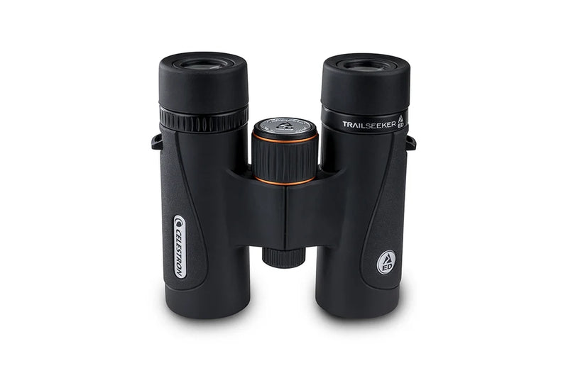Celestron TrailSeeker ED 10x32 roof binoculars showing the compact design and textured grip for outdoor wildlife viewing.
