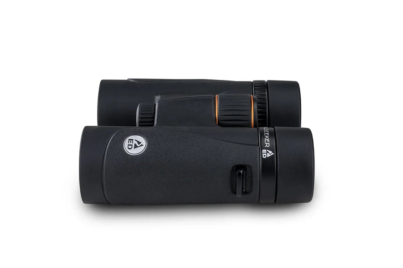 Celestron TrailSeeker ED 10x32 roof binoculars showing the compact design and eyepieces with textured focus wheel