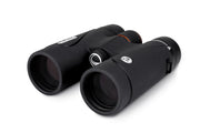 Celestron TrailSeeker ED 8x42 roof binoculars showing sleek black body and large objective lenses for outdoor wildlife viewing.