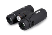 Celestron TrailSeeker ED 10x42 roof binoculars with textured black body and zoom eyepieces for outdoor wildlife viewing.