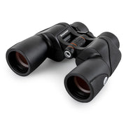 Celestron SkyMaster Pro ED 7x50 Porro binoculars showing large objective lenses and textured focus wheel.