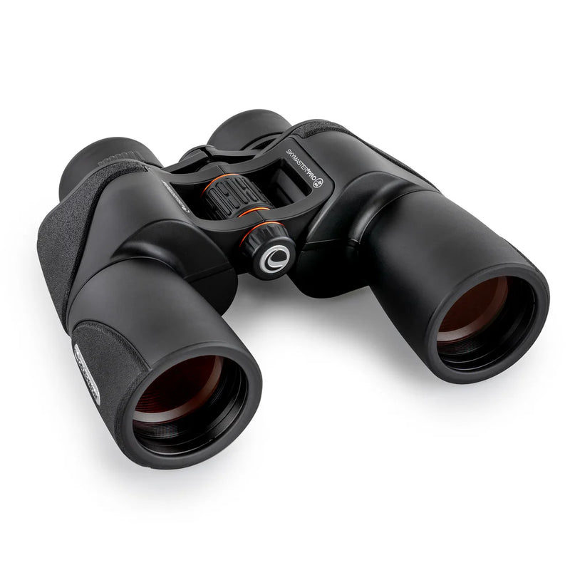 Celestron SkyMaster Pro ED 7x50 Porro binoculars with large objective lenses and textured focusing wheel, designed for astronomy and nature viewing.
