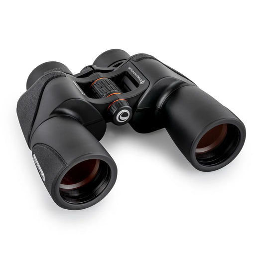 Celestron SkyMaster Pro ED 7x50 Porro binoculars with large objective lenses and textured focusing wheel, designed for astronomy and nature viewing.