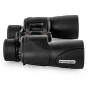 Celestron SkyMaster Pro ED 7x50 Porro binoculars showing large lenses and rugged design for astronomical and terrestrial viewing.