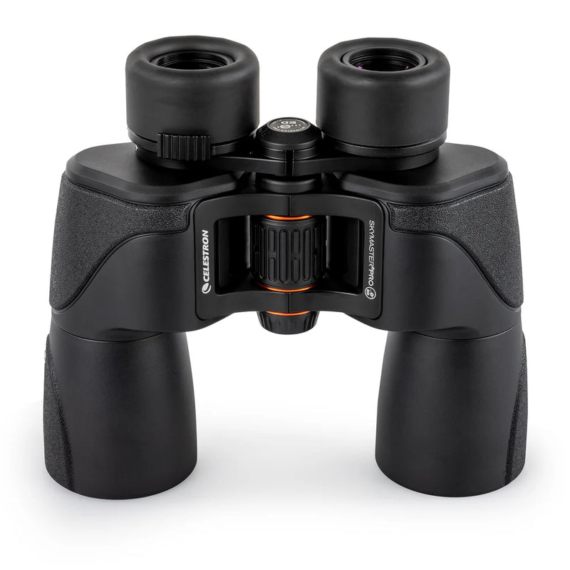 Celestron SkyMaster Pro ED 7x50 Porro binoculars showing large objective lenses and textured focus wheel for outdoor viewing