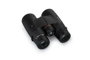 Celestron Nature DX 8x42 roof binoculars with black rubber armor, compact design, and adjustable eyepieces for outdoor viewing.