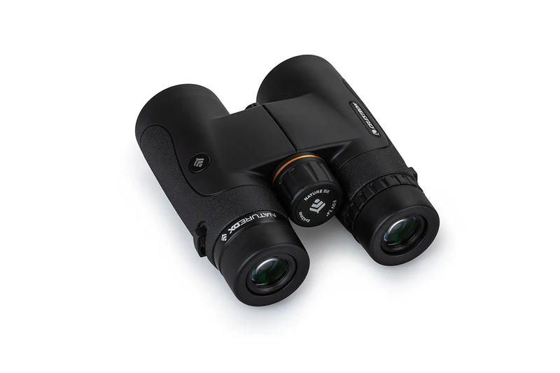 Celestron Nature DX 8x42 roof binoculars with black rubber armor, compact design, and adjustable eyepieces for outdoor viewing.