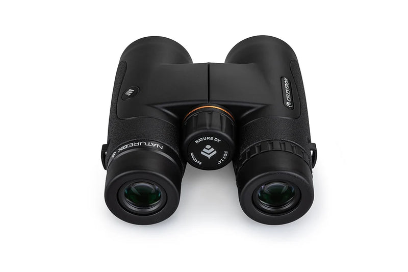Celestron Nature DX 8x42 roof binoculars with black body, ergonomic design, and adjustable eyecups for outdoor wildlife viewing.