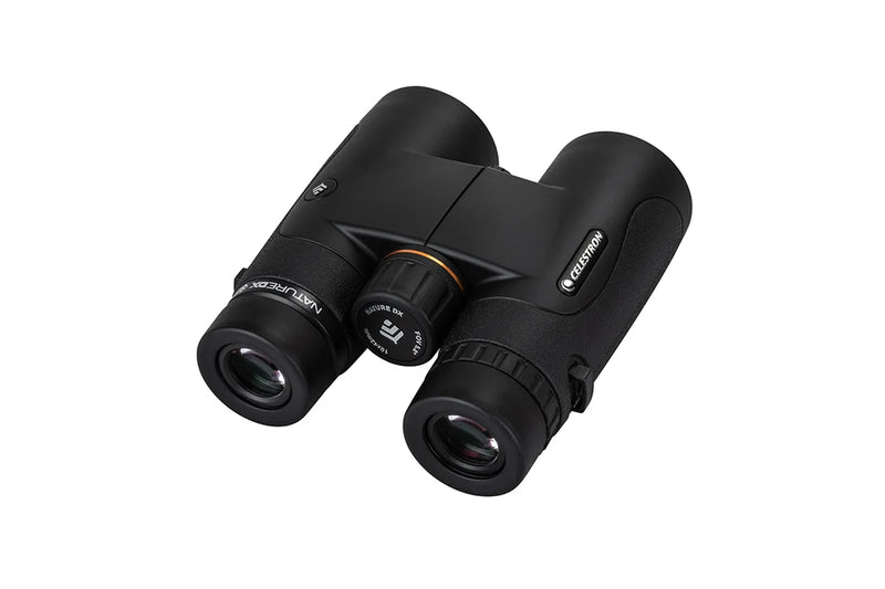 Celestron Nature DX black 10x42 roof binoculars with textured grip and large objective lenses for outdoor wildlife observation.