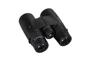 Celestron Nature DX black 10x42 roof binoculars with textured grip and large objective lenses for outdoor wildlife viewing.