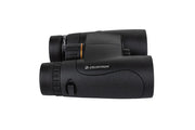 Celestron Nature DX black 10x42 roof binoculars with rubber armor and ergonomic design for outdoor wildlife viewing.
