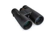 Celestron Nature DX 12x50 black roof binoculars showing close-up of eyepiece and objective lenses for wildlife observation.