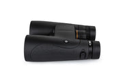 Celestron Nature DX 12x50 roof binoculars showing large eyepieces and textured focus wheel for outdoor wildlife viewing.