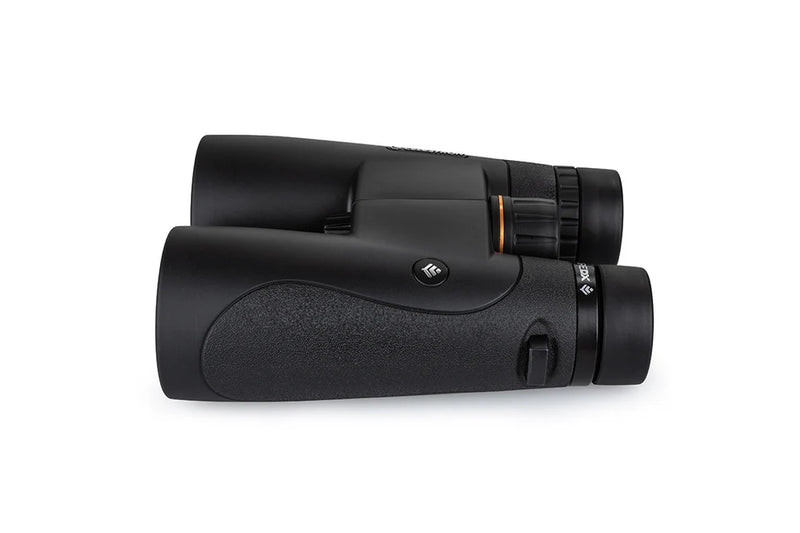Celestron Nature DX 12x50 roof binoculars showing large eyepieces and textured focus wheel for outdoor wildlife viewing.