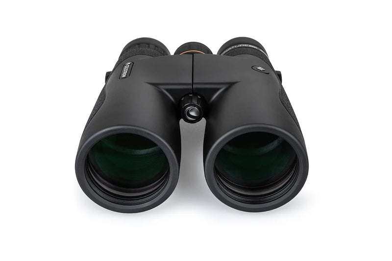 Celestron Nature DX black 12x50 roof binoculars showing a close-up of the binoculars with textured grip and lens details