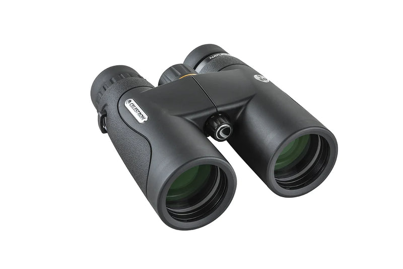 Celestron Nature DX 8x42 ED roof binoculars with ergonomic design, large objective lenses, and textured focus wheel for outdoor viewing.