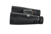 Celestron Nature DX 12x50 ED roof binoculars showing large objective lenses and textured focusing ring for outdoor viewing.