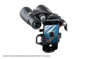 Celestron Nature DX 12x50 ED roof binoculars showing large eyepieces and textured grip for outdoor wildlife viewing.