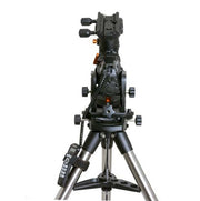 Celestron CGX 1100 EdgeHD Schmidt-Cassegrain telescope with tripod, featuring a large optical tube and advanced mount for astrophotography.