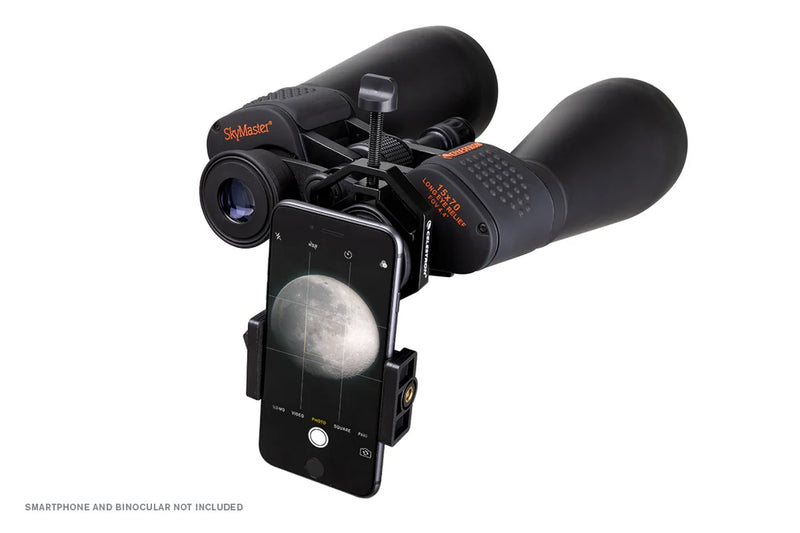 Celestron Basic Smartphone Adapter for telescopes, showing the black adjustable mount attached to a smartphone for astrophotography.