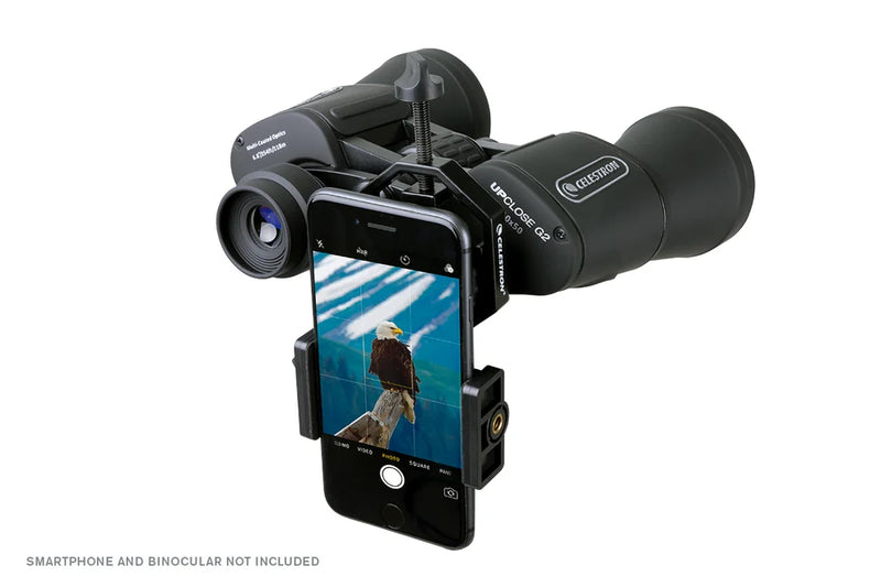 Close-up of a Celestron Basic Smartphone Adapter used for attaching smartphones to telescopes for astrophotography.