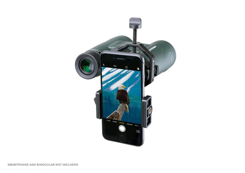 Celestron Basic Smartphone Adapter for attaching smartphones to telescopes or binoculars during outdoor nature observation.