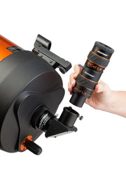 Celestron X-Cel LX 3x 1.25-inch Barlow lens for telescopes, shown with black body and focusing ring.
