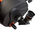Celestron Ultima Edge 1.25-inch 10mm eyepiece for telescopes, showcasing the high-quality optical design and black metal body.