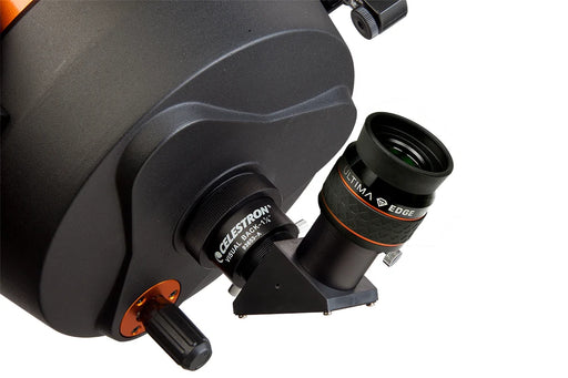 Celestron Ultima Edge 15mm 1.25-inch eyepiece for telescopes, showcasing the high-quality optical design and brand label.