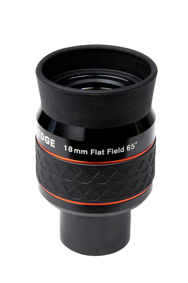 Celestron Ultima Edge 1.25-inch 18mm eyepiece with rubber grip and metal body for clear astronomical viewing.