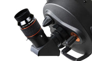 Celestron Ultima Edge 30mm 2-inch eyepiece showing the black and silver design and wide lens for astronomical telescopes.