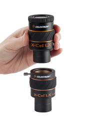Celestron 2x X-Cel LX Barlow lens for telescope eyepieces, showing the compact optical device with lens elements inside a metal barrel.
