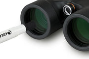Celestron Deluxe Lens Cleaning Kit with cleaning cloths, brushes, and solution for telescope and camera lens maintenance.