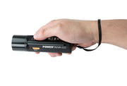Celestron PowerTank Glow 5000 red flashlight and portable charger with LED light and multiple charging ports for accessories.