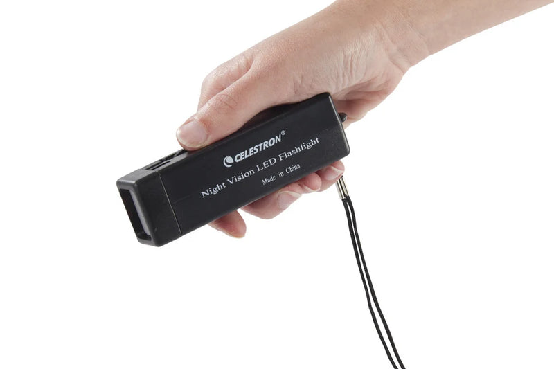 Celestron Night Vision Red Flashlight accessory with ergonomic handle and adjustable focus for astronomy and outdoor use.
