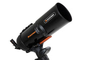 Celestron 6-inch aluminum dew shield with cover cap for telescope accessories, designed to protect optics from dew and dust.