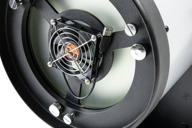 Celestron USB cooling fan attached to a Dobsonian telescope, designed to reduce temperature and improve viewing clarity.