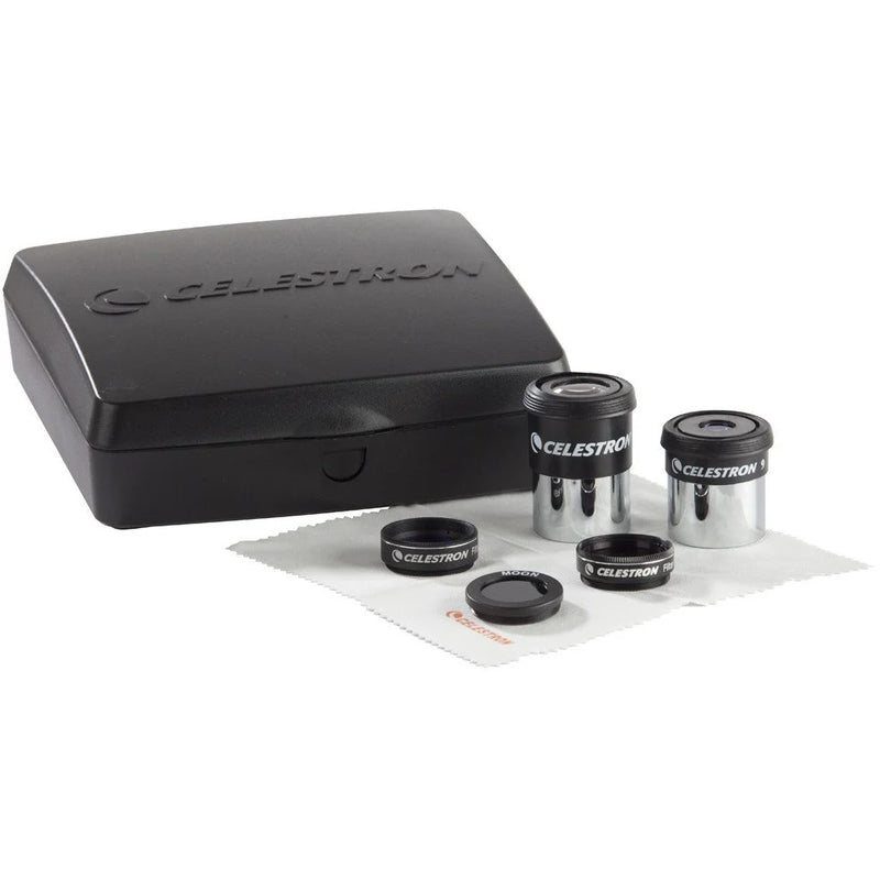 Celestron PowerSeeker Accessory Kit with eyepieces, filters, and adapters for telescope enhancement.