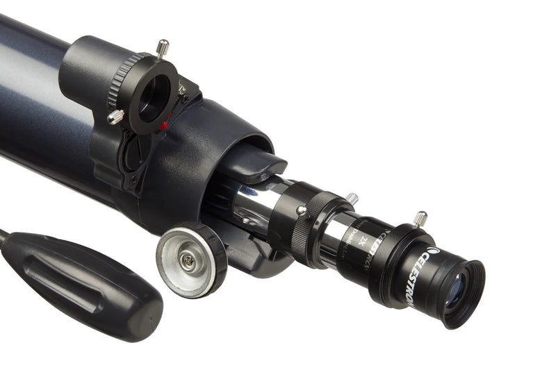 Celestron AstroMaster accessory kit with telescope eyepieces, filters, and tools for astronomy enthusiasts.