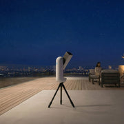 VAONIS Vespera III smart telescope mounted on tripod, showcasing its compact design and user-friendly interface for stargazing.